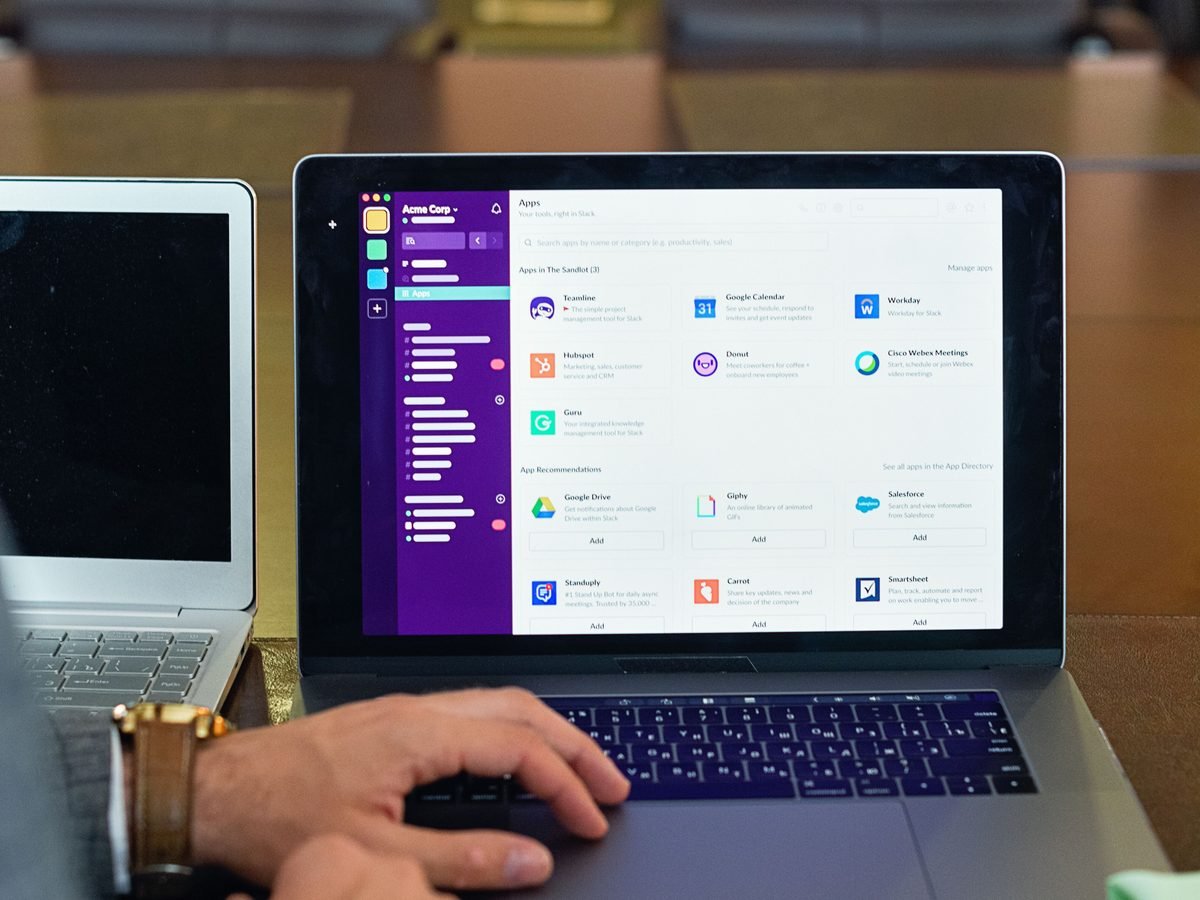 Laptop showing a workspace app with connected business tools